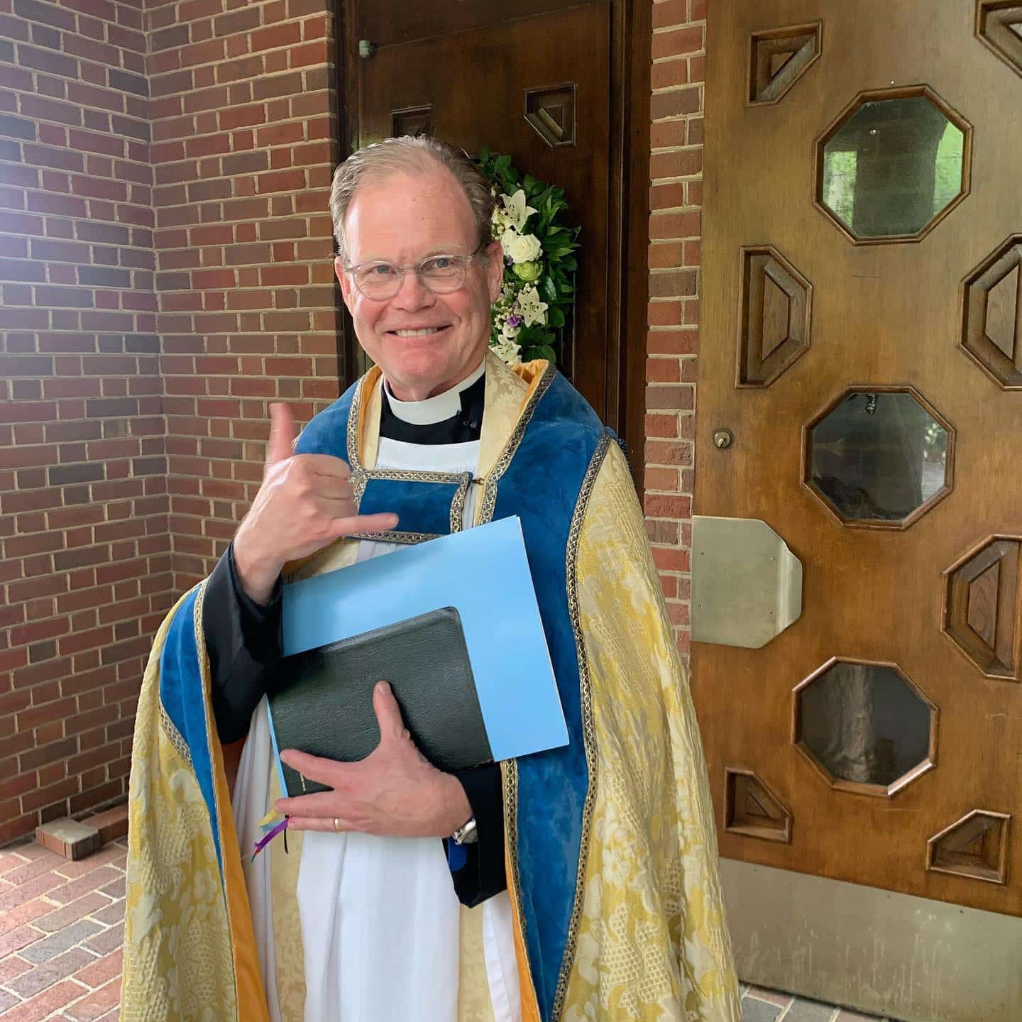 Bishop waving happily The Impact of Respite Care