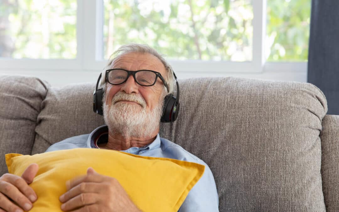 old man listening to music
